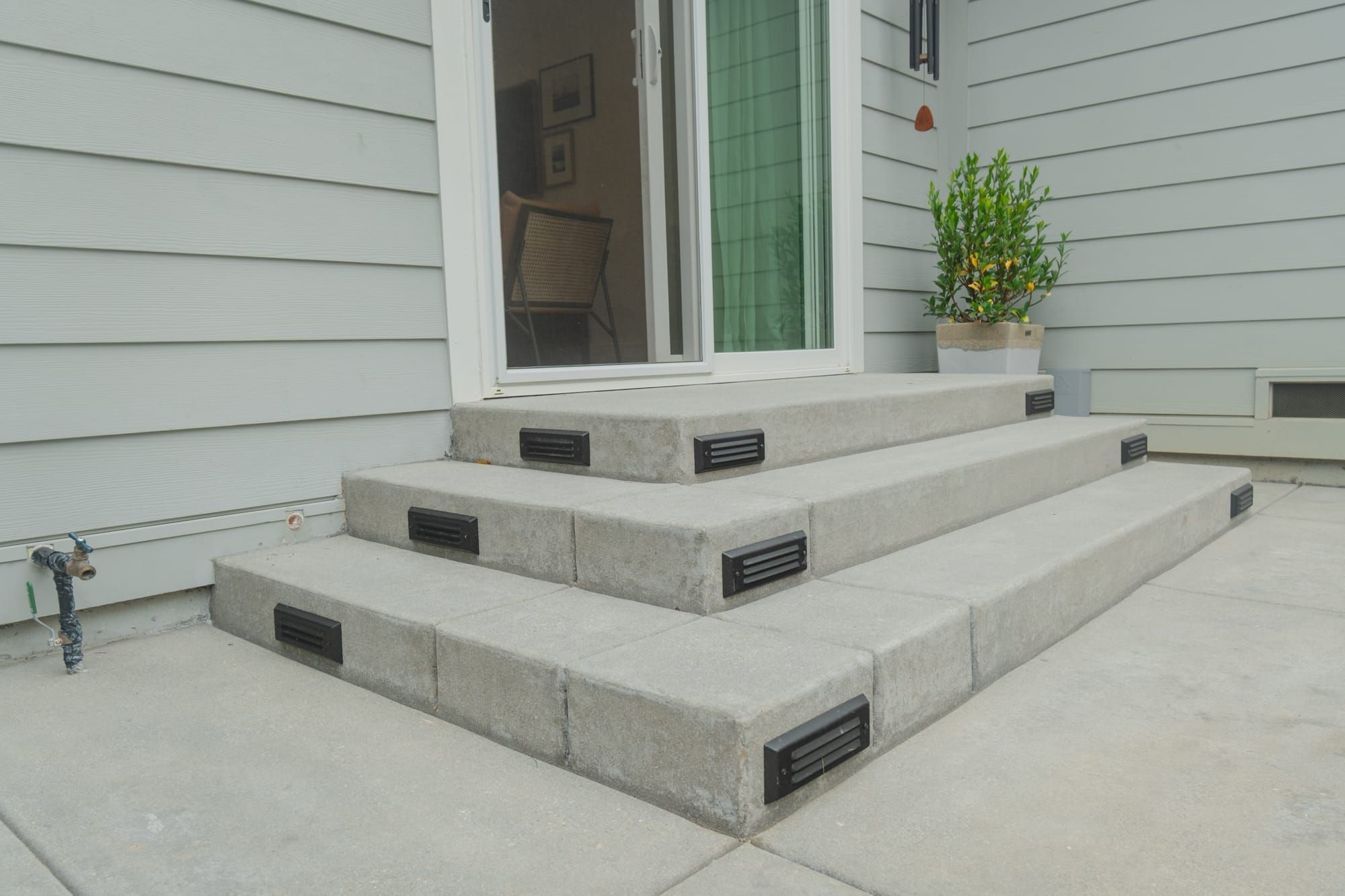 Custom concrete steps with integrated step lighting in Sacramento